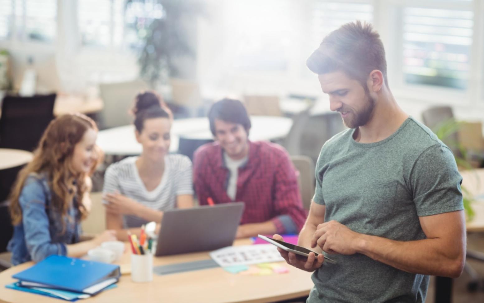 Students working on financial planning exercises in a collaborative learning environment